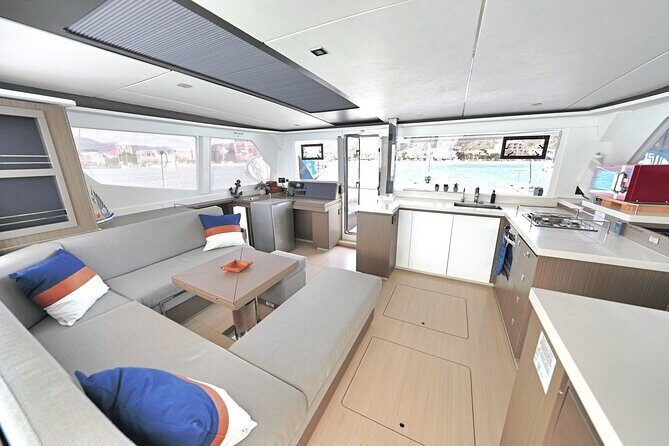 Don't Worry - Private Half Day Catamaran Cruise in St Maarten - On-Board Comfort: Drinks, Snacks, Toys, and Fishing Gear