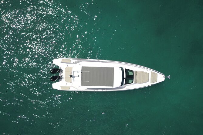 Private Charter Tour on Noali Axopar 37 Around St. Martin - Baie Rouge: orange sand photos and a rock-hole swim moment