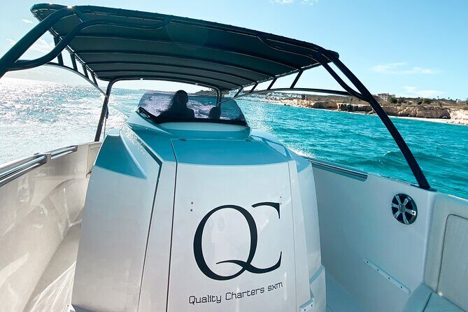 Private Full-Day Speed Boat Tour of St. Martin with Luxury Lunch - Long Bay and Belmond La Samanna: rocks, clear water, and a famous pass