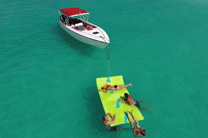 Private Speed Boat Charter in St Maarten & Nature Reserve - La Samanna and Baie Longue: a shaded, resort-adjacent beach moment