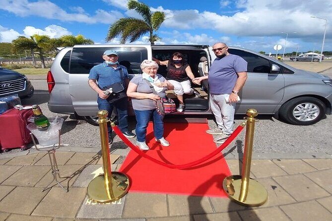 St. Maarten V.I.P Airport pick up and taxi services - The ride experience: professional chauffeur, tour guide, and your choice of vibe