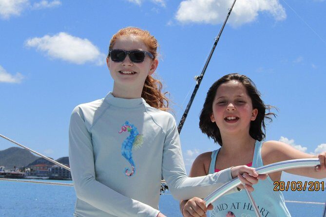 The Best Catamaran Day Sail in St Maarten - Stop Two at Little Bay: swing time plus more water play